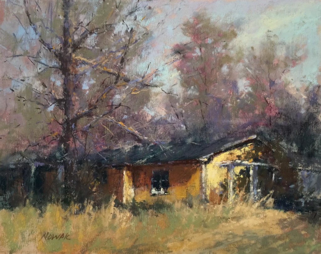 Nancy Nowak, "Little Yellow House," 2015, pastel on UArt 400. This yellow house is in a neighborhood close to my house. I truly didn’t think I was painting the ugly yellow house… I was focused on painting the light on the arbor and facade of the house. 