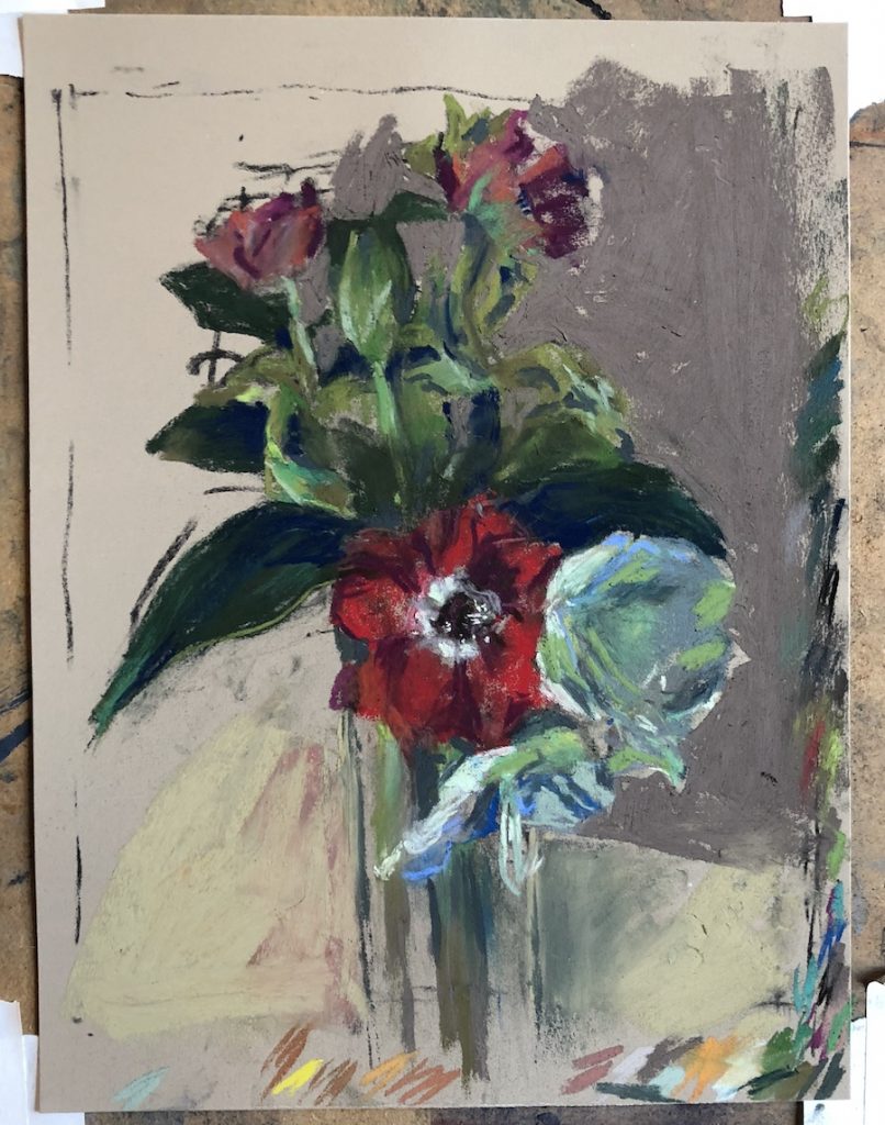 Steph Mouw, laying the background for "Amaryllis and Anemones," assorted pastels on Pastel Premier, 12 x 9 in. I liked how the middle-dark value background grey pops the greens and florals forward and creates space around them.