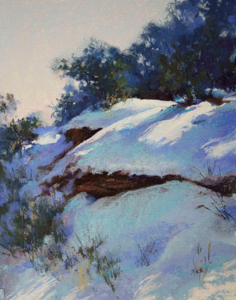 Diane Fechenbach, Cold Sunshine, 2017, Ludwig, Sennelier, and Unison on UART paper, 14x11 in. A snowy embankment in the Colorado National Monument.