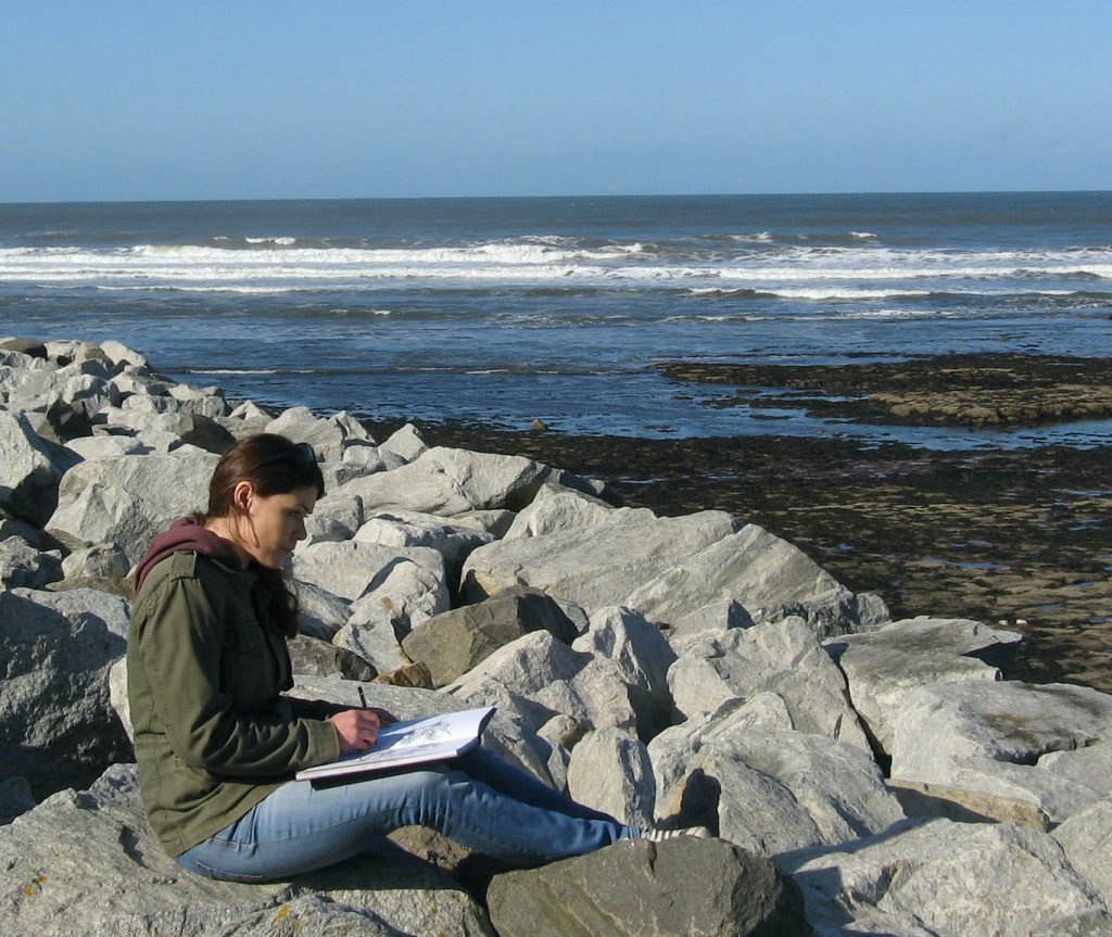 Janine Baldwin sketching at South Bay, Scarborough
