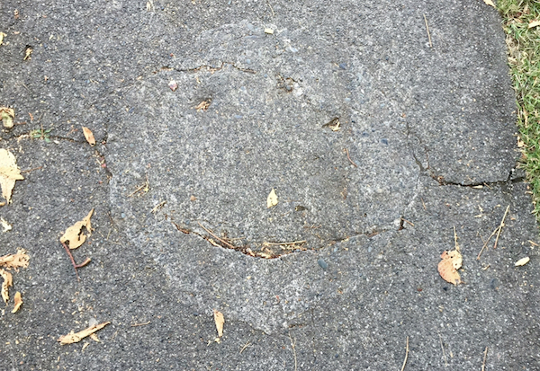 Noticing the smile in the pavement :-)